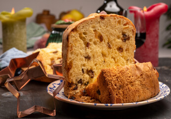 Christmas food, fresh Italian panettone cake made from yeast dough with dried fruits