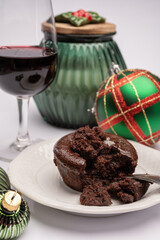 Popular british christmas food, glass of vintage ruby port wine and hot chocolate cake with christmas tree decoration on background