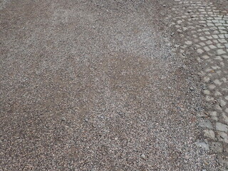 pedestrian sidewalk with cobbles being repaired
