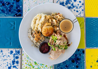 Complete Holiday Turkey Dinner On Colorful Table