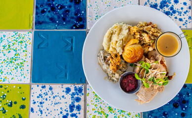 Complete Holiday Turkey Dinner On Colorful Table