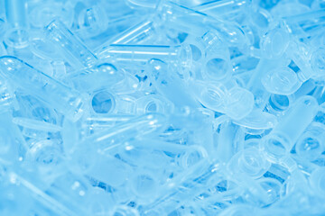 Many used eppendorf or microcentrifuge tubes. Chemical and plastic waste. 