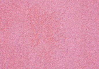 Grungy pink background of natural cement or stone old texture as wall in retro style. Background for design