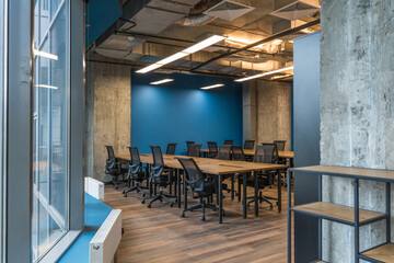 Big wooden table with office chairs