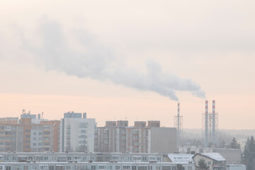 Fototapeta premium Smoking a pipe of heating plants supplying heat to the city