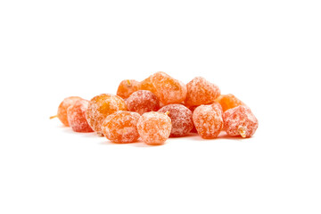 Dried kumquats, heap of candied fruits isolated on white