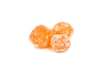 Dried kumquats, candied fruits isolated on white