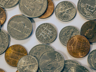 Closeup of assorted American coins. Currency. background