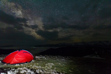 Night photos in the Ukrainian Carpathian Mountains with a bright starry sky and the Milky Way	