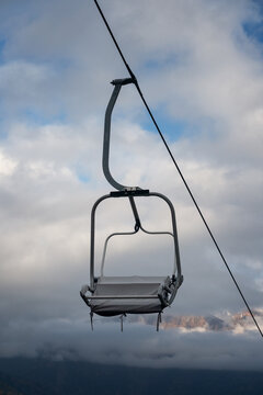 Ski Lift Chair And Clouds