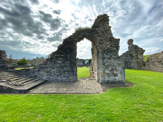 Fototapeta na wymiar Old stone Abbey ruins, in the village of Sawley, Bolton by Bowland, UK