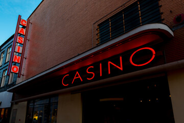 Fototapeta na wymiar Red casino neon sign. Neon lights.