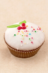 Chocolate muffin cake with light glaze, close up