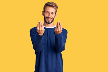 Handsome blond man with beard wearing casual sweater doing money gesture with hands, asking for...