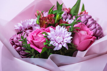 Pink bouquet isolated on a pink background