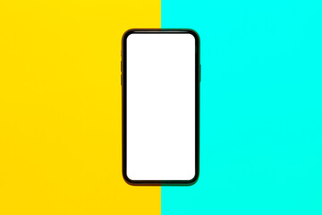 Close-up of smartphone with mockup on background of yellow and cyan colors.