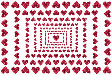 Pattern of red flower petals in shape of hearts isolated on white background.