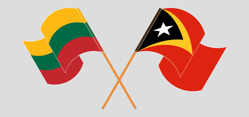 Crossed and waving flags of Lithuania and East Timor
