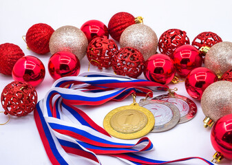 Sports awards. Christmas tree toys and medals.