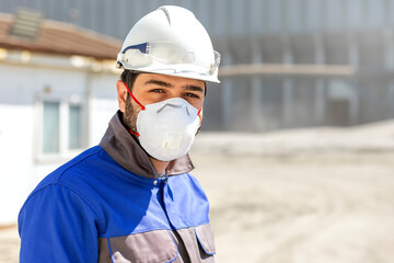 Fototapeta na wymiar Coronavirus disease and construction workers. Potential sources of exposure include having close contact with a coworker or member of the public who is ill with covid-19.