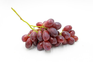 Obraz premium bunch of pink red grapes isolated on white