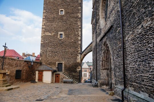 Medieval stone St. Bartholomew&acute;s Church in autumn day, arched windows, chimeras and gargoyles, Gothic Cathedral with belfry in Kolin, Central Bohemia, Czech republic