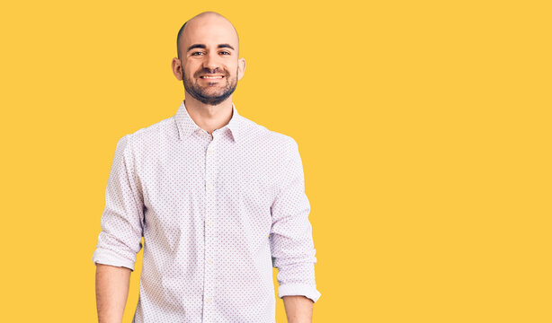 Young handsome man wearing elegant shirt with a happy and cool smile on face. lucky person.