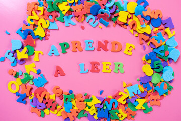 Learn to read written in spanish. Educational concept made with colorful letters.