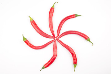 Red hot chili peppers on a white background. food figures. Vitamin vegetable food