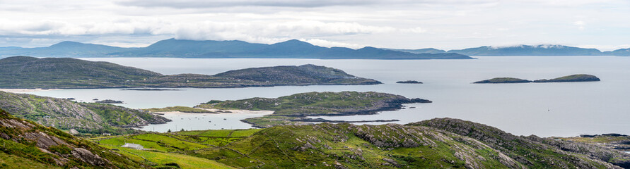 Naklejka na ściany i meble Amazing panoramic view from Com an Chiste Pass, Ring of Kerry, Iveragh Peninsula, County Kerry, Ireland, Europe. Part of North Atlantic Way