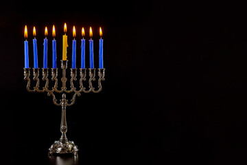 Jewish holiday Hanukkah with menorah traditional candelabra