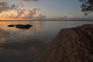Sunrise over a calm lake in Queensland, Australia
