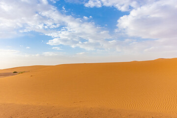 Fototapeta na wymiar Beautiful landscape of the dunes in the Sahara Desert, Merzouga, Morocco