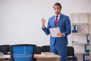 Young businessman making presentation during pandemic