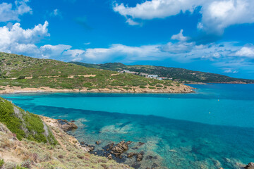 Fototapeta na wymiar Beautiful turquoise water of a bay in Asinara Island, Sardinia