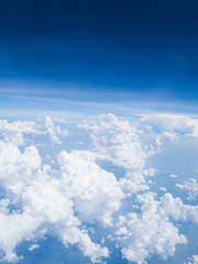 View of blue sky background with white cloud on high level