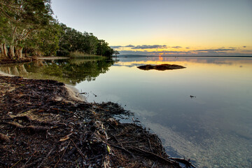 Summer sunrise over the Lake Cootharaba near Boreen Point, on the Sunshine Coast of Australia
