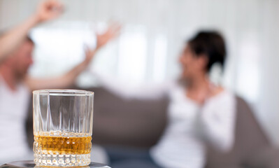 Angry woman yelling at her lazy husband
