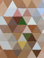 Colorful triangles pattern with a rough texture background. Background texture wall and have copy space for text. Picture for creative wallpaper or design art work.