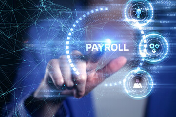 The concept of business, technology, the Internet and the network. A young entrepreneur working on a virtual screen of the future and sees the inscription: Payroll