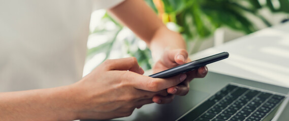 Woman using smartphone, During leisure time. The concept of using the phone is essential in everyday life.