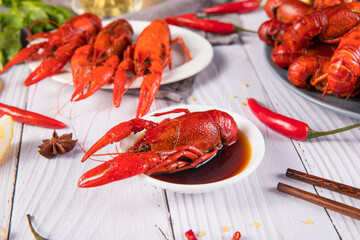 closeup gourmet  lobster on white wooden table