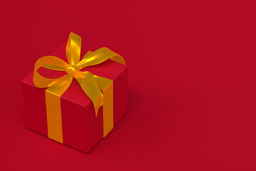 red gift box 3d with yellow ribbon and bow on red background