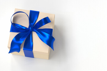 cream gift box 3d with blue ribbon and bow on white background