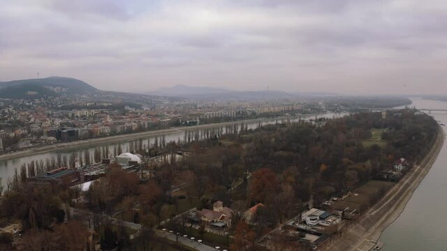 Aerial View Of Margaret Island (Margit-Sziget) In The Middle Of Danube River In Budapest, Hungary During Autumn - panning drone