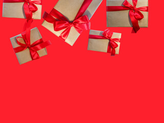 Gift boxes with red ribbon, copy space. Sale concepts, discounted price, Christmas gifts and...