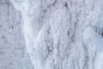 frozen ice and snow on the wall. Snow pillow. A lot of snow. Cold winter.
