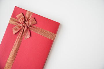 Gift box mockup on the white table with copy space. Merry christmas and happy new years background for text advertise.