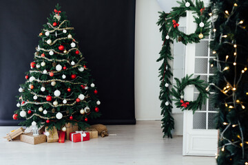 Winter New Year holiday interior Christmas tree decor presents December