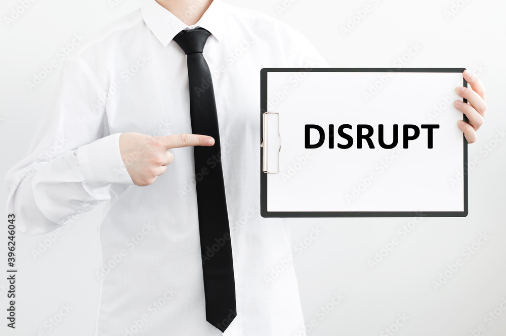 Poster a businessman holds a folder with documents, the text on the folder is - disruptive. business concep